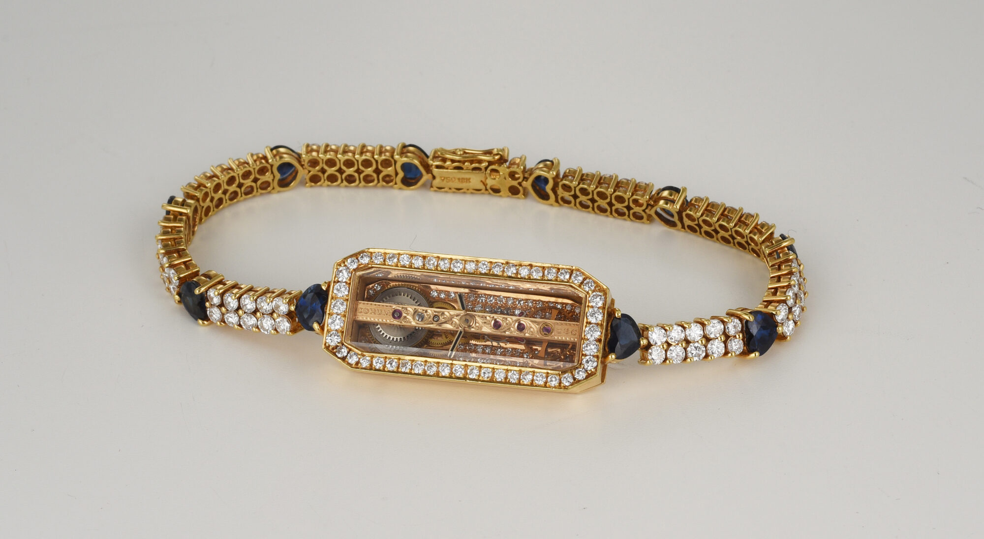 1980s Ladie's Corum Golden Bridge watch in 18K Yellow Gold w/Diamonds & Sapphires Ref.13104 - Image 8