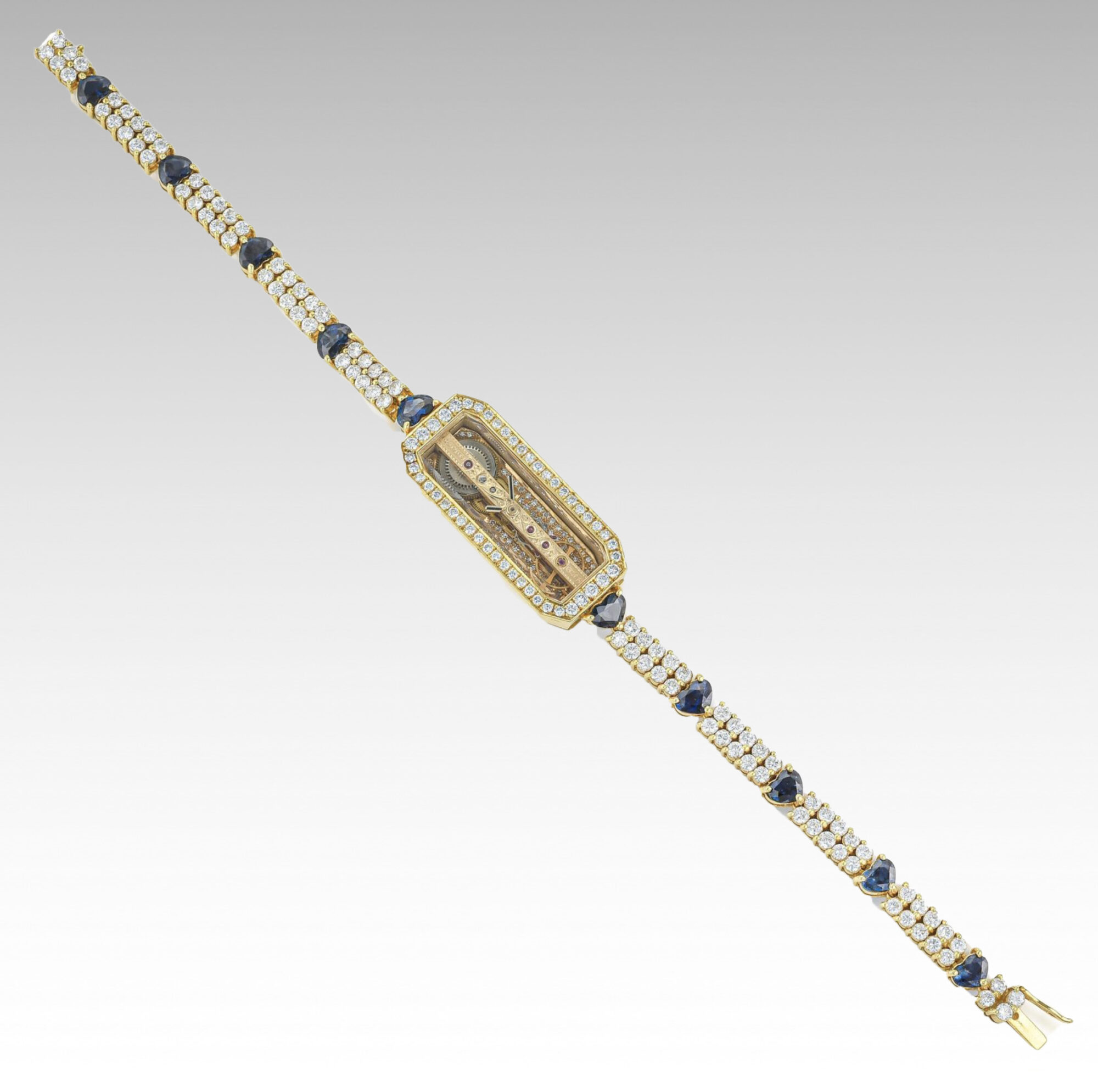 1980s Ladie's Corum Golden Bridge watch in 18K Yellow Gold w/Diamonds & Sapphires Ref.13104 - Image 5